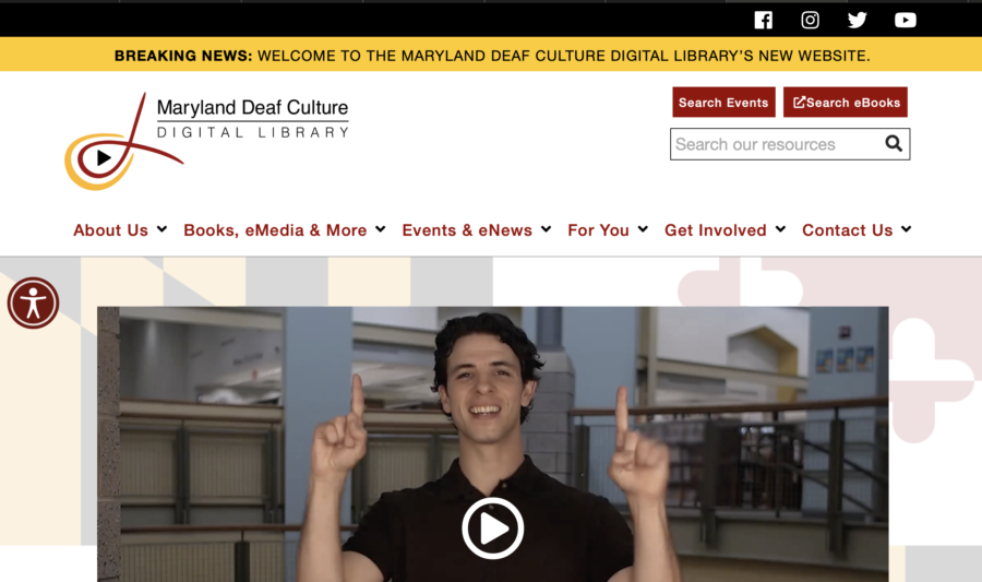 front page screenshot with menu, video still, and logo displayed for DCDL